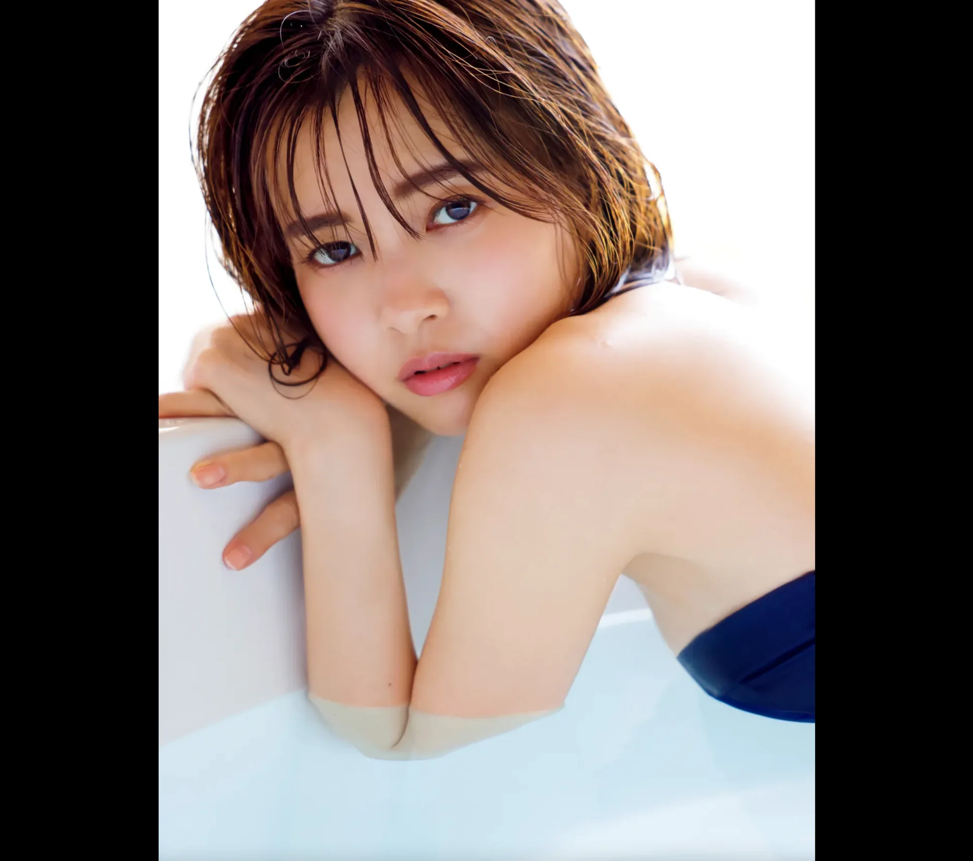 新條由芽