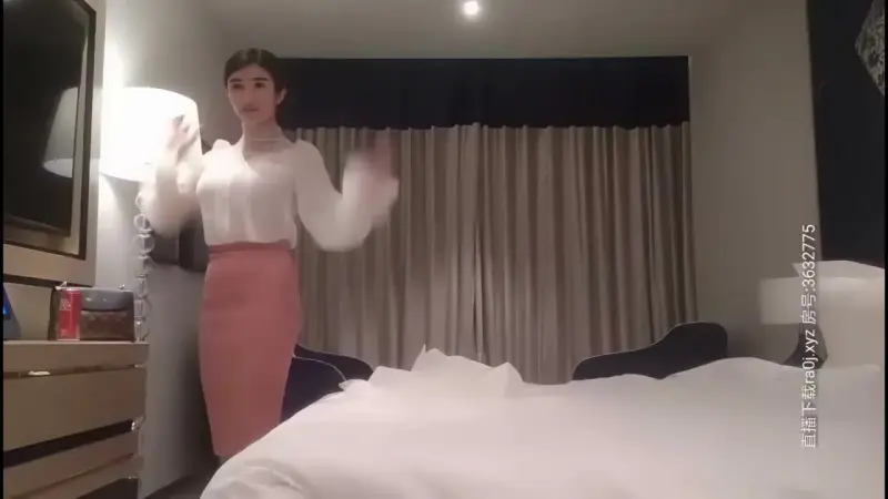 Stewardess in white dress and pink skirt, already wet before she started
