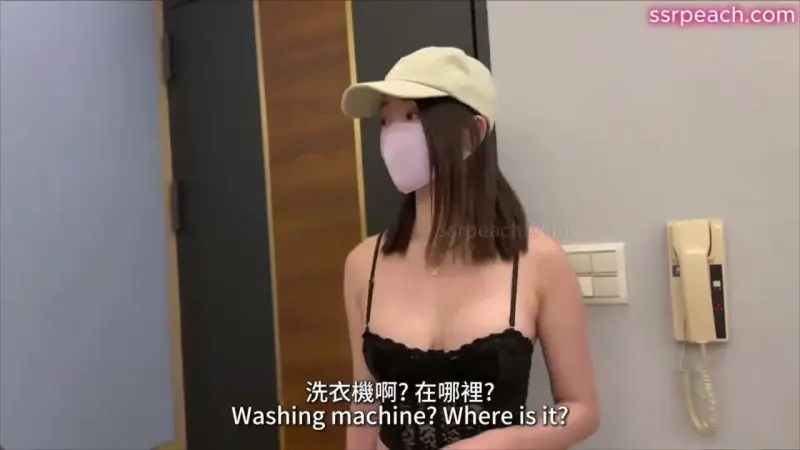 Female plumber repairs washing machine at otaku's house